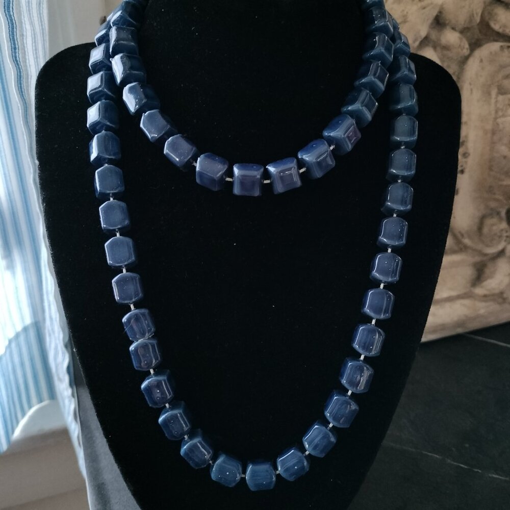 dark blue plastic bead necklace